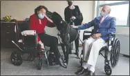  ??  ?? Sal Markowitz, 96, (right) and Sandra Greer, 82, (left) visit with Marley, a Great Dane, while therapeuti­c activities director Catherine Farrell looks on at The Hebrew Home.