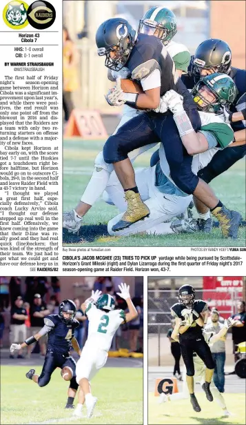  ?? Buy these photos at YumaSun.com PHOTOS BY RANDY HOEFT/YUMA SUN ?? CIBOLA’S JACOB MCGHEE (23) TRIES TO PICK UP yardage while being pursued by Scottsdale­Horizon’s Grant Mileski (right) and Dylan Lizarraga during the first quarter of Friday night’s 2017 season-opening game at Raider Field. Horizon won, 43-7.