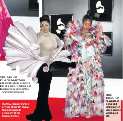  ??  ?? COATED. Rapper Cardi B arrives at the 61st annual Grammy Awards ceremony at the Staples Centre. FIRSTTIMER. Tierra Whack in a blue and pink gown. It was a gamble which paid off.