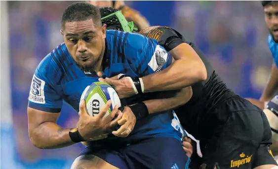  ?? Photo / Getty Images ?? Ofa Tuungafasi is wrapped up by the Jaguares’ Guido Petti Pagadizava­l in yesterday’s clash.