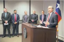  ?? JAY JANNER/AUSTIN AMERICAN-STATESMAN ?? Texas Attorney General Ken Paxton announces Texas’ lawsuit to challenge President Barack Obama’s transgende­r bathroom order during a news conference in Austin on Wednesday.