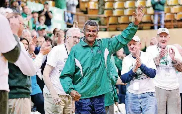  ?? [AP PHOTO] ?? Former Marshall and NBA star Hal Greer receives a standing ovation during the Veterans Memorial Field House finale in Huntington, West Virginia, in February 2012. Greer, a Hall of Fame guard for the Philadelph­ia 76ers, died Saturday at age 81.