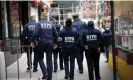  ?? Photograph: Mike Segar/Reuters ?? NYPD officers patrol through the Chinatown section of Manhattan in March 2021.