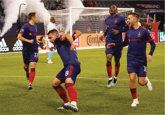  ?? CHICAGO FIRE FC ?? Luka Stojanovic (8) scored the Fire’s second goal, which evoked cheers and flag-waving from fans who had waited 13 months to see the team at Soldier Field.