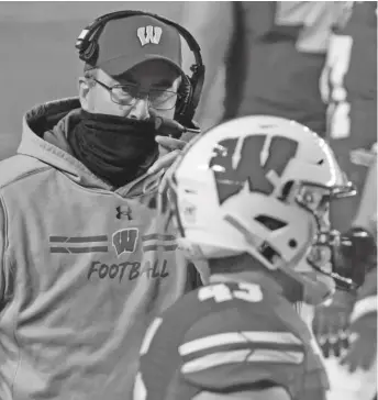  ?? AP ?? Wisconsin head coach Paul Chryst is one of 12 people associated with the program who tested positive.