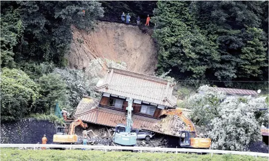  ?? The Yomiuri Shimbun ?? A house that was destroyed in a landslide where two people died is seen in Higashi-Hiroshima, Hiroshima Prefecture, on July 14.