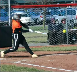  ?? Staff photo/Mike Frank ?? HAnnAh Oldiges eArns A hit lAst week in Minster’s win over New Bremen. The WildcAts scored 10 runs on 10 hits.