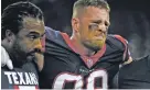  ?? ERIC CHRISTIAN SMITH/THE ASSOCIATED PRESS ?? Texans defensive end J.J. Watt is helped off the field after breaking his left leg during Sunday’s game against the Chiefs.