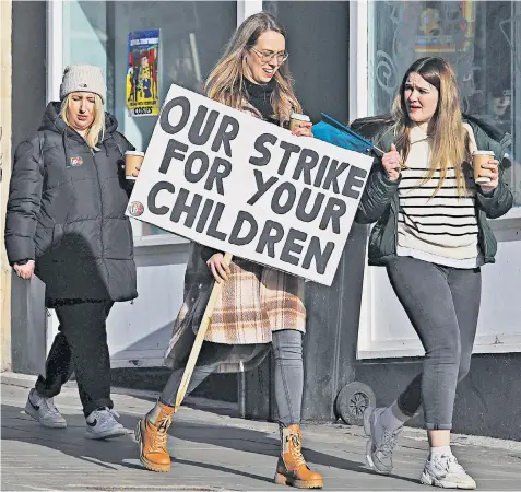  ?? ?? Teachers in Bristol joined the strike which forced the majority of state schools across England and Wales to fully or partially close yesterday in a row over pay