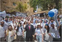  ?? (David Salem) ?? OLIM CELEBRATE their first Independen­ce Day in Israel yesterday at Ulpan Etzion in Jerusalem together with Jewish Agency acting chairman Yaakov Hagoel.