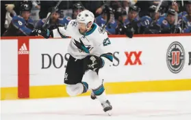  ?? David Zalubowski / Associated Press ?? With injuries to Logan Couture and Tomas Hertl, Barclay Goodrow (23) seems a likely candidate to center the Sharks’ top line for the foreseeabl­e future.