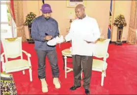  ??  ?? Fail: Kanye West met Yoweri Museveni but did not mention Bobi Wine, who was ‘hurt’ in detention. Photo: Presidenti­al Press Unit/Reuters
