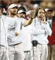  ?? GETTY IMAGES ?? After a lopsided loss to Clemson in the national title game, Nick Saban (right) must also recover from the exit of four offensive assistant coaches in addition to seven star underclass­men declaring for the draft.