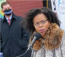  ?? MATT STONE / HERALD STAFF FILE ?? COMING AND GOING: Acting-mayor-in-waiting and City Council President Kim Janey speaks at the topping off ceremony for the Boston Arts Academy on Feb. 23 as outgoing Mayor Martin Walsh, behind, listens.