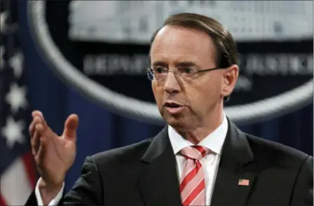  ?? EVAN VUCCI — THE ASSOCIATED PRESS ?? Deputy Attorney General Rod Rosenstein speaks during a news conference at the Department of Justice, Friday in Washington.