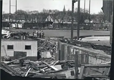  ?? THE MILWAUKEE JOURNAL ?? The left field stands are all but gone as demolition of Borchert Field continues, as shown in the March 24, 1953, Milwaukee Journal. Dismantlin­g of the ballpark began in December 1952 as County Stadium got underway.