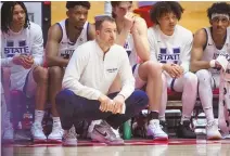  ?? CHANCEY BUSH/JOURNAL ?? Utah State coach Danny Sprinkle watches from the sideline during the Aggies’ Jan. 16 game against New Mexico at the Pit. The teams rematch Saturday in Logan, Utah.