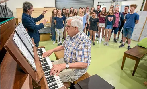  ?? MYTCHALL BRANSGROVE/STUFF ?? The Dutch Nightingal­es choir performed at the South Island Organ Company on Tuesday as part of their South Canterbury visit. Choir organist Jan Damen, accompanie­s the choir during an impromptu performanc­e.