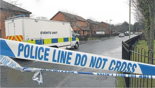  ?? Pictures: Gareth Jennings. ?? A police cordon and officers standing guard at the city’s Drumlanrig Drive.