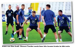  ??  ?? Eyes on the ball: Steve Clarke watches his team train in Nicosia