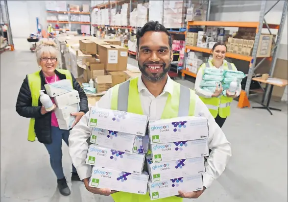  ?? Picture: Rodney Braithwait­e ?? Providing protection: Shepparton FoodShare’s Grace Grieve, with Mervyn Fernando and Kim Watkins of Indigenous Medical Supplies, is ready to distribute vital supplies.