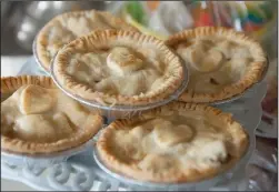  ?? BEA AHBECK/NEWS-SENTINEL ?? Corner Scone Bakery’s pot pies with carrot, corn, green beans, potato, brown gravy and chicken are seen at the Lodi store on Tuesday. They are freshly made every day and can be frozen.