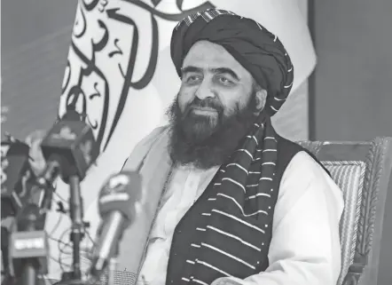 ?? MUHAMMAD FAROOQ/AP ?? Amir Khan Muttaqi, part of Afghanista­n’s new Cabinet, said the Taliban won’t allow militants on Afghan soil to threaten other countries.