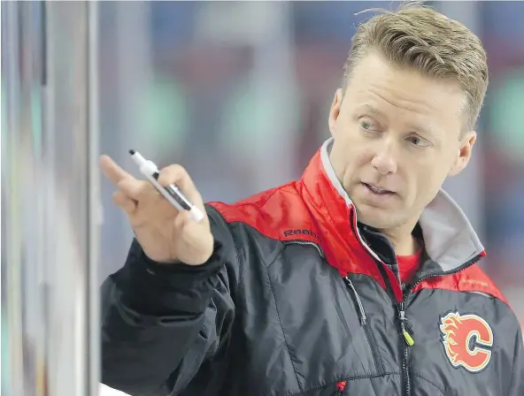  ?? — POSTMEDIA NEWS FILES ?? Whether it’s a clip of Tom Brady or Michael Jordan, Flames head coach Glen Gulutzan likes to showcase winning strategies to his players by illustrati­ng how prolific sports figures have pushed themselves to be their best.