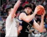  ?? BILL UHRICH — READING EAGLE ?? Exeter’s Anthony Caccese, who finished with 22 points, goes to the basket during the Eagles’ win over Manheim Central.