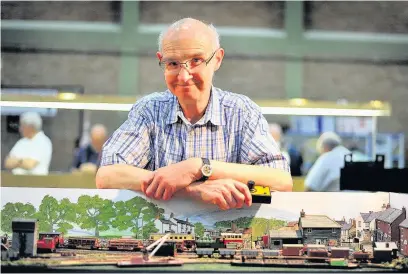  ??  ?? Roger Christian with his railwayat the 2014 Model Railway Exhibition