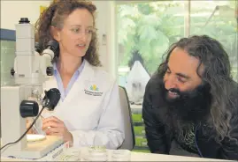  ?? Picture: AAP/supplied by Parks Australia ?? Protecting the future: Seed scientist Dr Gemma Hoyle-Farrell speaking to gardening guru Costa Georgiadis.