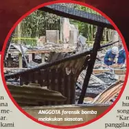  ??  ?? ANGGOTA forensik bomba melakukan siasatan.