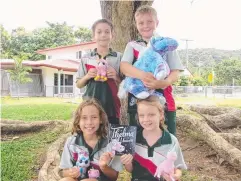  ??  ?? UNICORNERS: Students Hunter Smith, Bode Pollard, Zoe O'Flanagan and Alivia Herlihy embrace the Year of the Unicorn.