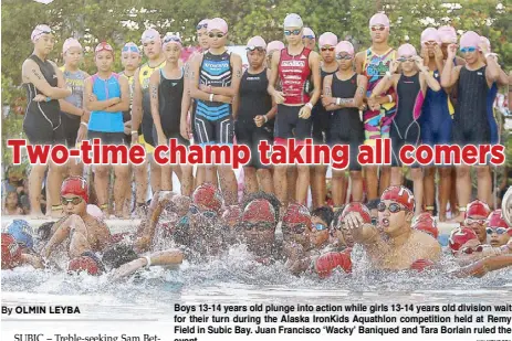  ?? JUN MENDOZA ?? Boys 13-14 years old plunge into action while girls 13-14 years old division wait for their turn during the Alaska IronKids Aquathlon competitio­n held at Remy Field in Subic Bay. Juan Francisco ‘Wacky’ Baniqued and Tara Borlain ruled the event.