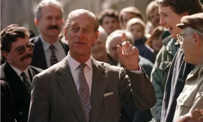  ?? Photograph: Sean Gallup/Getty Images ?? Prince Philip shares a laugh with locals during a walking tour in the Czech town of Kutna Hora in 1996.