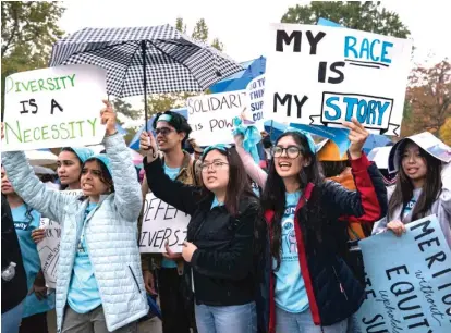  ?? AP FILE ?? Students and activists rally Oct. 31 outside the Supreme Court before oral arguments in two cases that could decide the future of affirmativ­e action in college admissions.