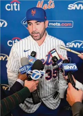  ?? Seth Wenig/Associated Press ?? The New York Mets’ Justin Verlander talks with reporters at a news conference at Citi Field on Dec. 20 in New York. The team introduced Verlander after they agreed to a $86.7 million, two-year contract. It’s part of an offseason spending spree in which the Mets have committed $476.7 million on seven free agents.
