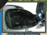  ??  ?? Bagasi luas bisa menampung 2 helm full face