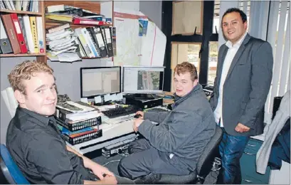  ??  ?? Engineerin­g success: While gaining work experience at Porirua City Council, autistic Johnsonvil­le student Josh Drakeford, centre, met mayor Nick Leggett, right, and council engineerin­g cadet Sean de Roo, who showed him how to use the Computer Aided...