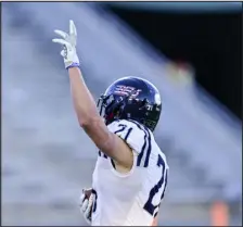  ?? ANDY CROSS — THE DENVER POST ?? Columbine’s Josh Snyder celebrates a touchdown against Cherry Creek in the Class 5A championsh­ip game at Canvas Stadium in Fort Collins on Dec. 2.