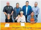  ?? ?? Raymond Tuuta (back left, trustee), Nathan Peri (negotiator), Anaru Marshall (lead negotiator), Sam Tamarapa (trustee), Rowena Henry (front left, advisory trustee), Eileen Hall (trustee) with mokopuna Sade, and Tamzyn-Rose Pue (Te Tumu Ahurea).