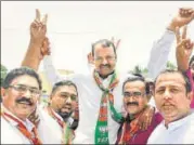  ?? HT ?? BJP candidate Rajendra Gavit celebrates with his supporters .