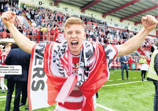  ??  ?? Winner Greg Docherty celebrates his play-off clincher