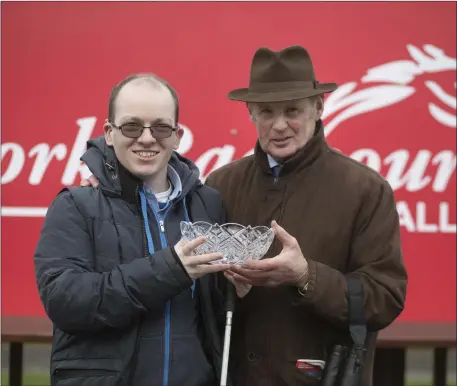  ??  ?? Donal Ahern, Ballynoe, made it a 21st birthday to remember at Cork Racecourse, Mallow, last Saturday. Donal, a keen student of horse pedigrees, presented the winning trophy to Frank Berry, on behalf of JP McManus, after Concordin, trained by Robert Tyner, romped home in the 2m 4f Handicap Chase. Donal, a third-year UCC psychology student, is an avid racegoer; is St Catherines GAA’s number-one supporter; and a lover of rugby.