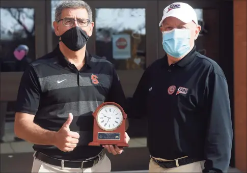  ?? Arnold Gold / Hearst Connecticu­t Media ?? Shelton High School athletic director John Niski, left, was honored with the Athletic Director of the Year award by Paul Mengold, CIAC associate director of unified sports, earlier this month.