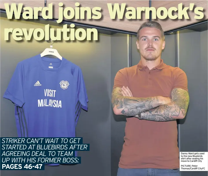  ?? PICTURE: Peter Thomas/Cardiff CityFC ?? Danny Ward gets used to the new Bluebirds shirt after sealing his move to Cardiff City This newspaper is published by MediaWales, a subsidiary company of Trinity Mirror PLC, at 6 Park Street, Cardiff, CF10 1XR and printed by Newsquest Printing Oxford,...