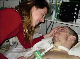  ??  ?? Freak accident: Tom Nabarro in hospital with Ellen in 2007
