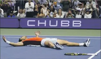  ?? Charles Krupa Associated Press ?? CARLOS ALCARAZ, who needed three five-set victories to reach the U.S. Open final, finally could exhale after winning the title over Casper Ruud to become the world’s No. 1-ranked player.