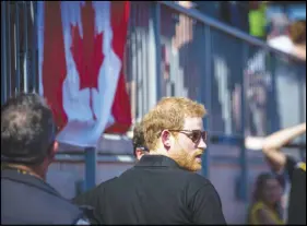  ?? CP PHOTO ?? Prince Harry enters York Lions Stadium to award medals for the women’s 100metre dash at the Invictus Games in Toronto.