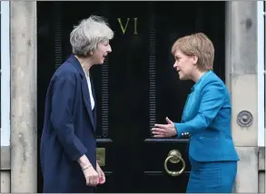  ??  ?? Prime Minister Theresa May and Nicola Sturgeon